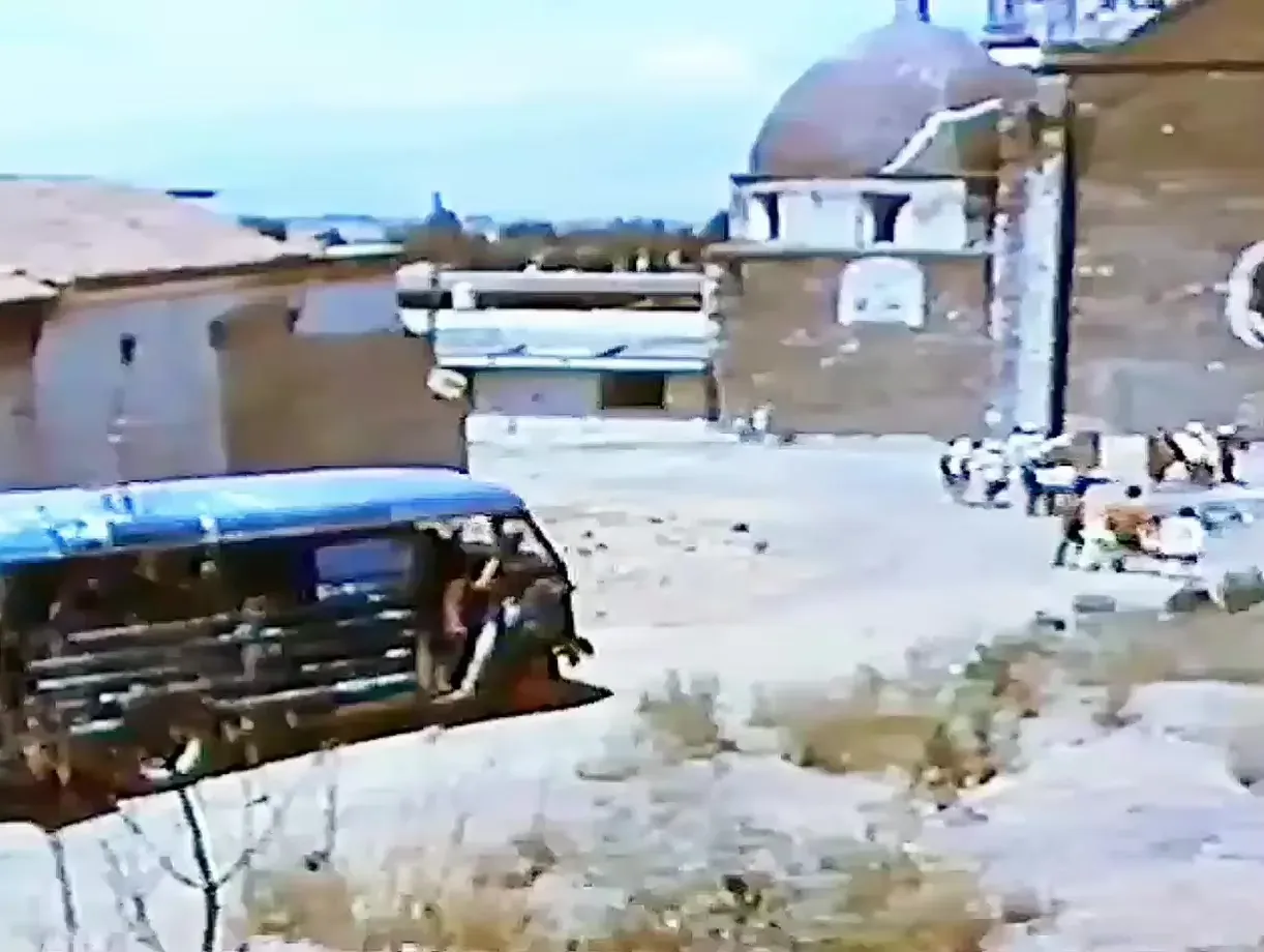 A cartonería Judas figure in front of the church, before the burning, in 1975.